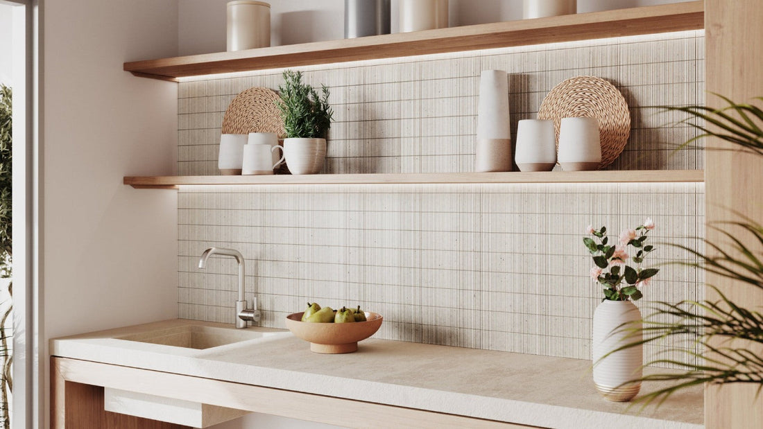 Modern kitchen with light wood floating shelves and textured backsplash.
