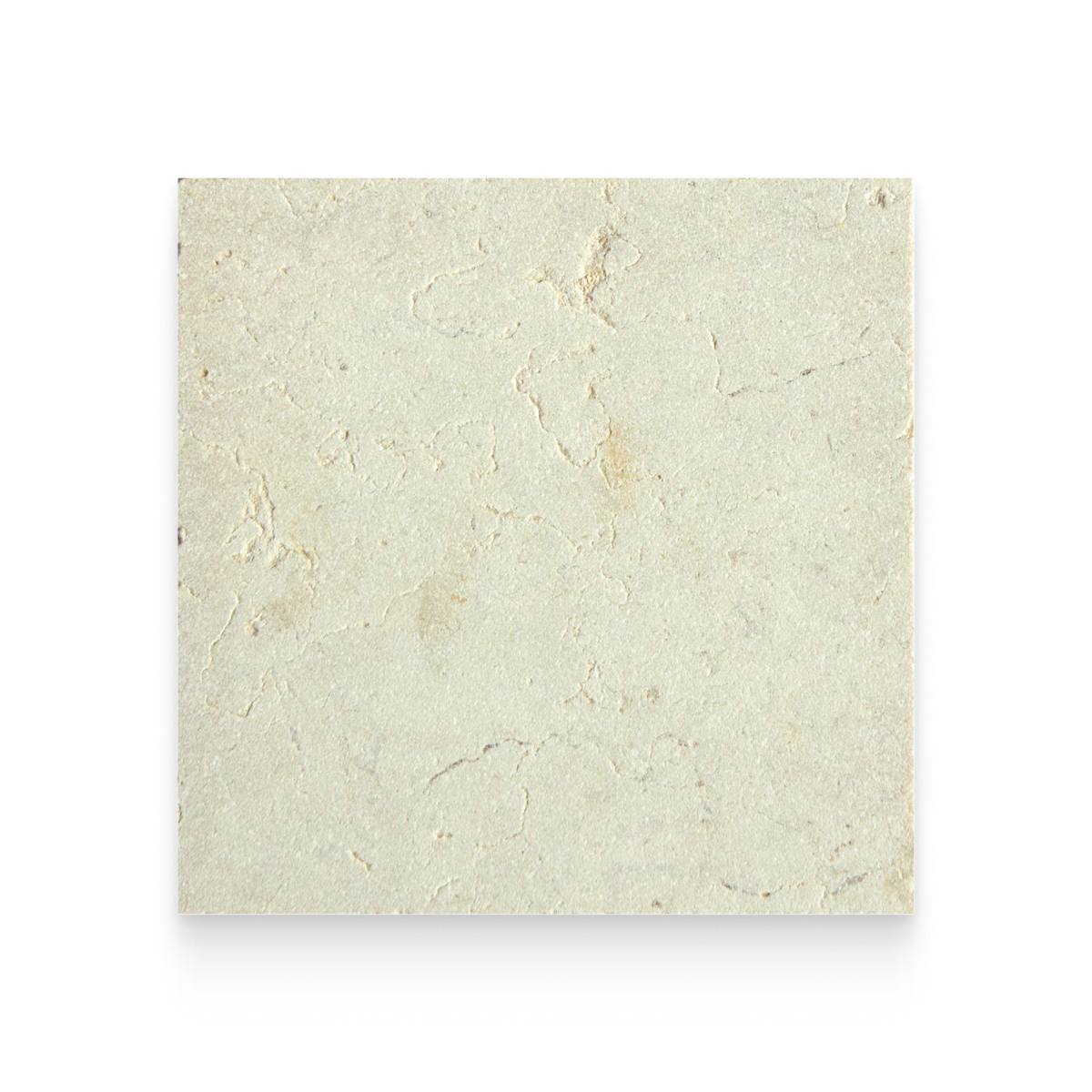 A square sample of light beige limestone tile showcasing natural textures, subtle veining, and organic indentations.
