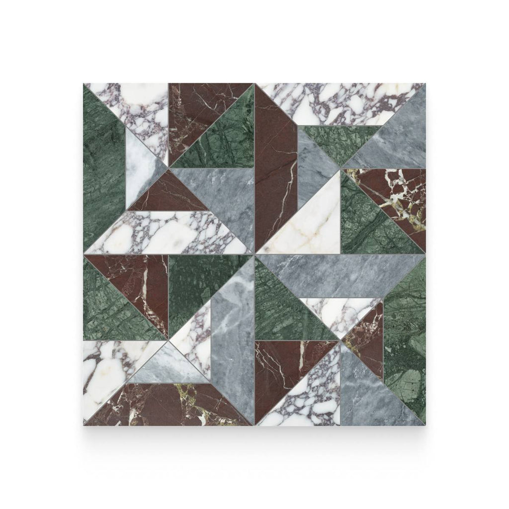 A close-up of a geometric mosaic floor tile layout composed of multi-colored marble triangles in shades of green, dark red, gray, and heavily veined white.