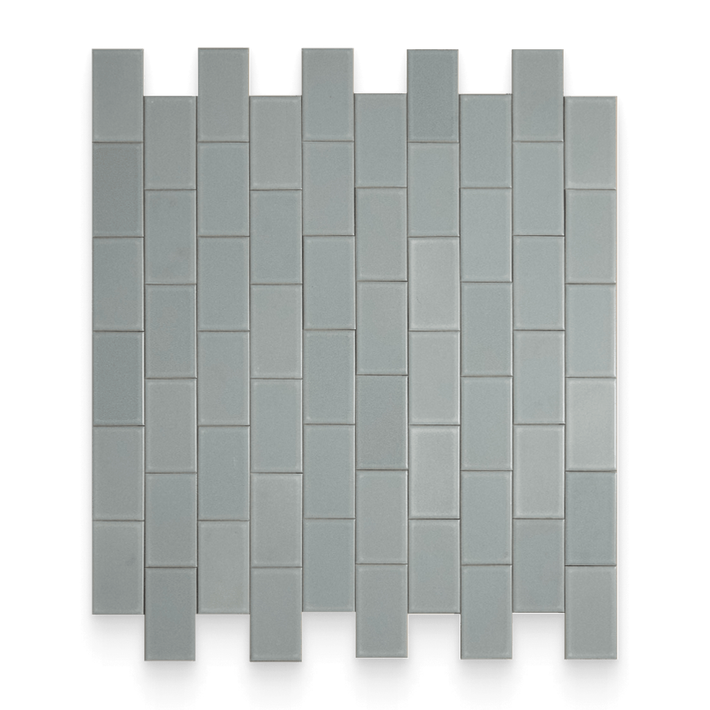 Gray rectangular tiles arranged in a pattern on a white background