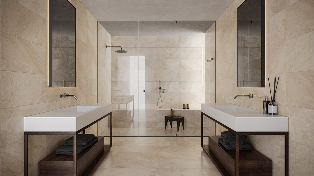 Rectangular light beige stone-look tiles used continuously on the walls and floors of a contemporary bathroom suite.